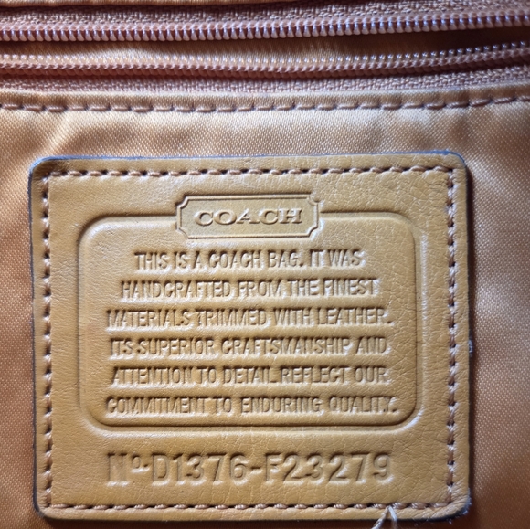 Coach Park Signature Hobo Shoulder Bag model number F23279. 